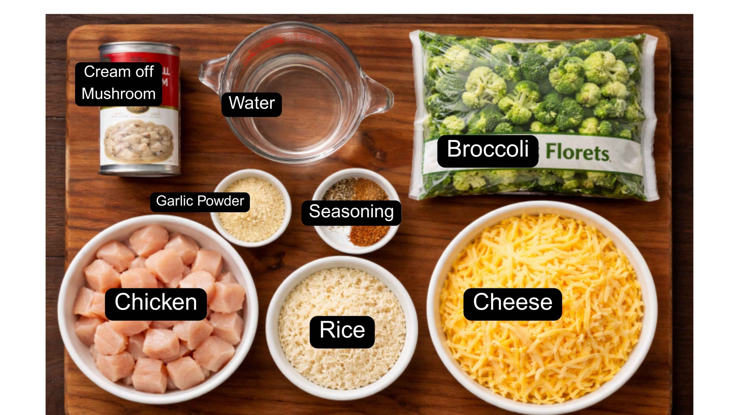 A flat layer of ingredients used to make my old-fashioned chicken and rice casserole. It includes chicken, rice, broccoli cheese, seasoning, and water.