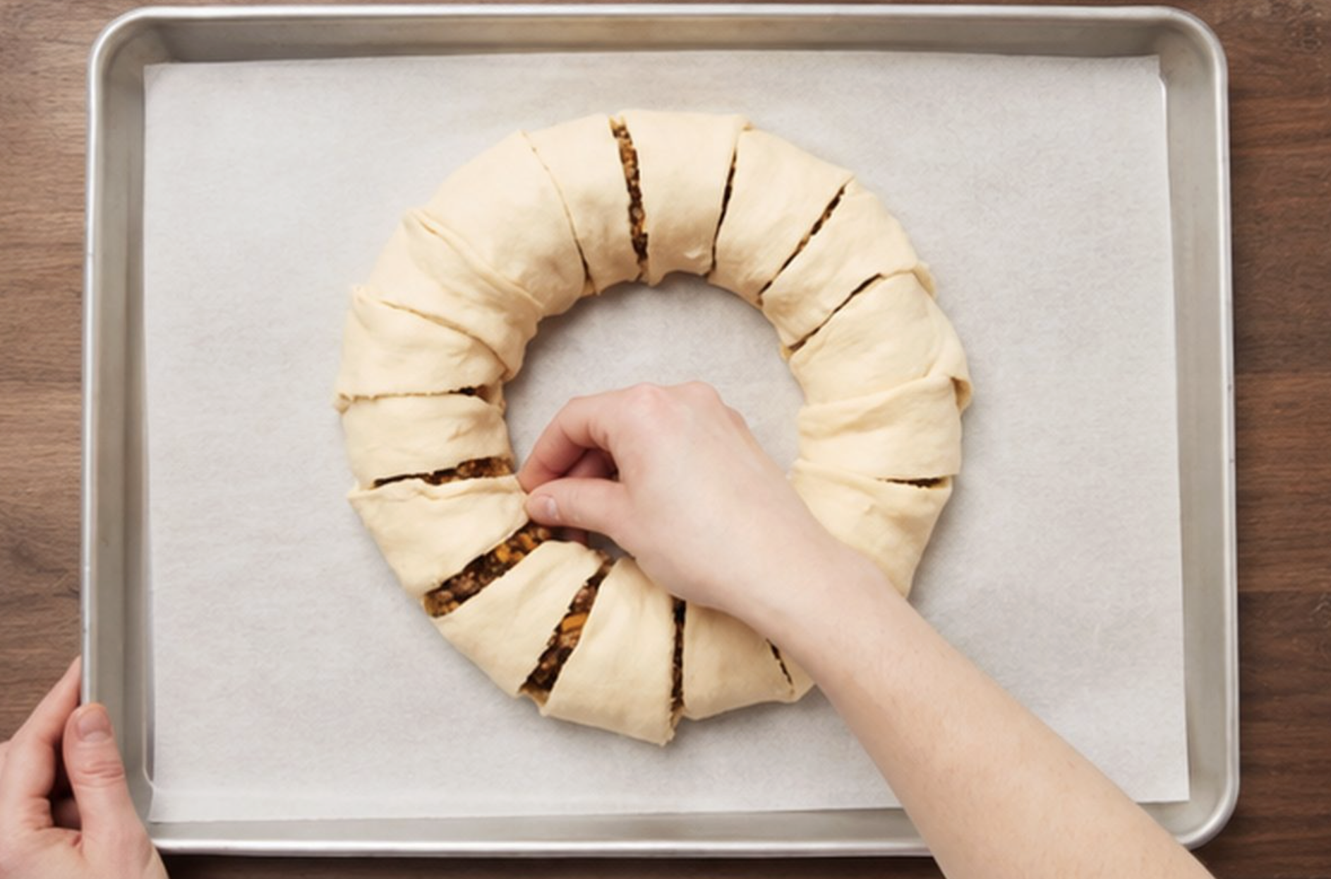 Crescent roll dough folded over taco meat and cheese filling