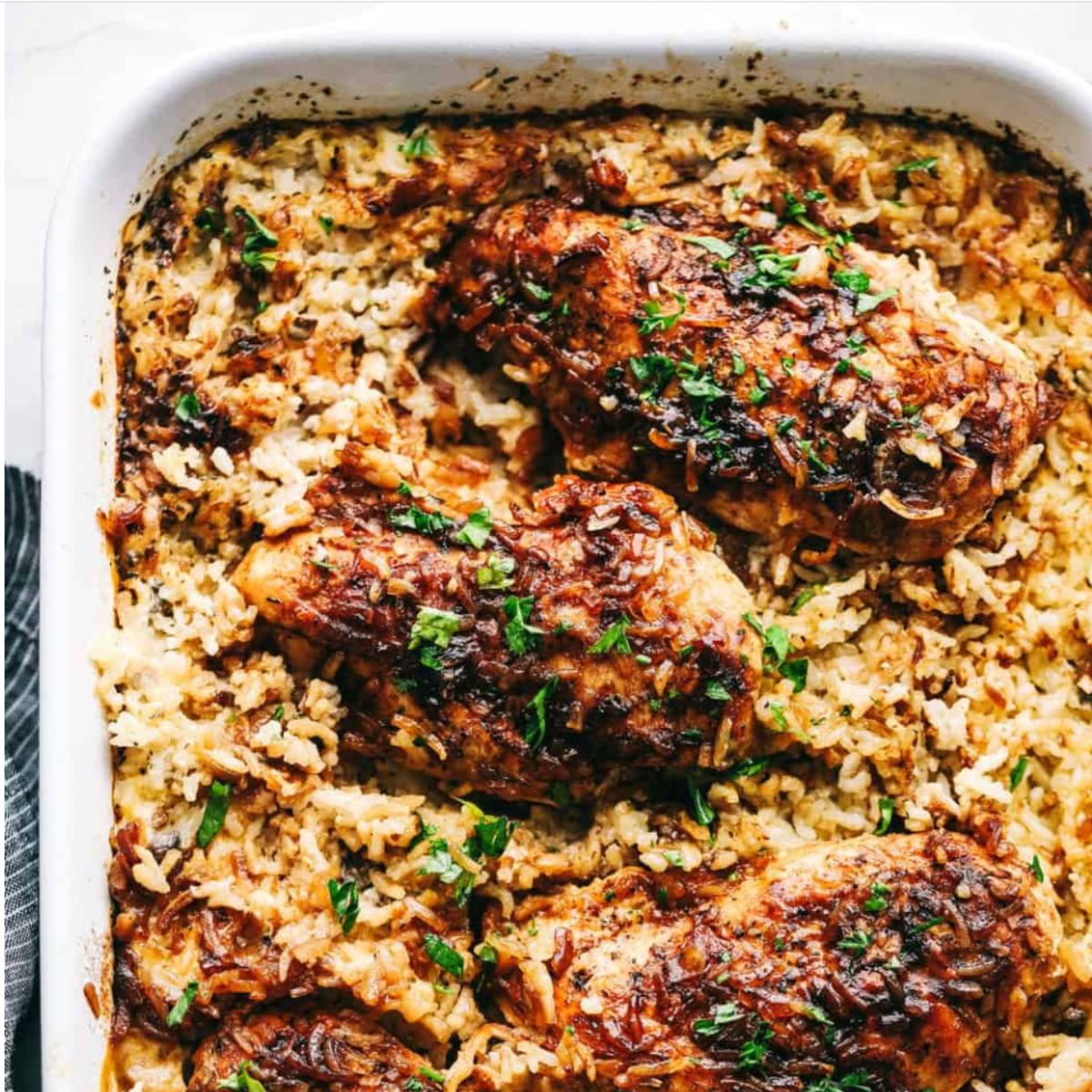 Chicken and Rice Bake with Cream of Mushroom Soup in baking dish