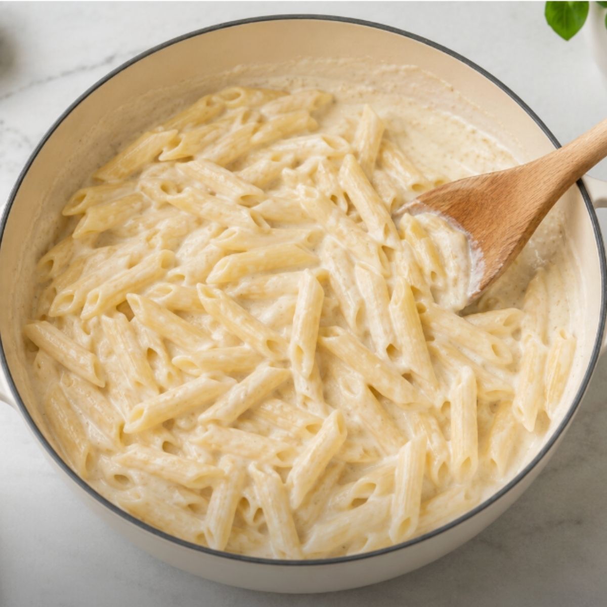 pasta being cooked with cottage cheese pasta sauce.