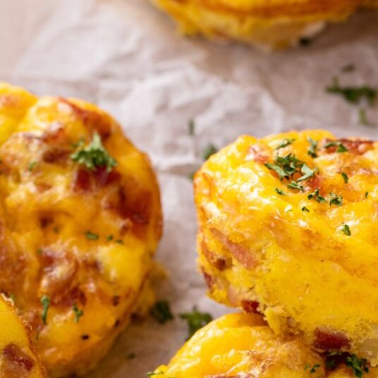 veggie egg bites stacked on parchment
