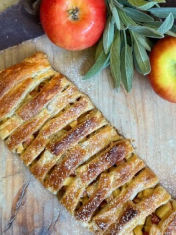 Apple Puff Pastry Recipe on cutting board with apples