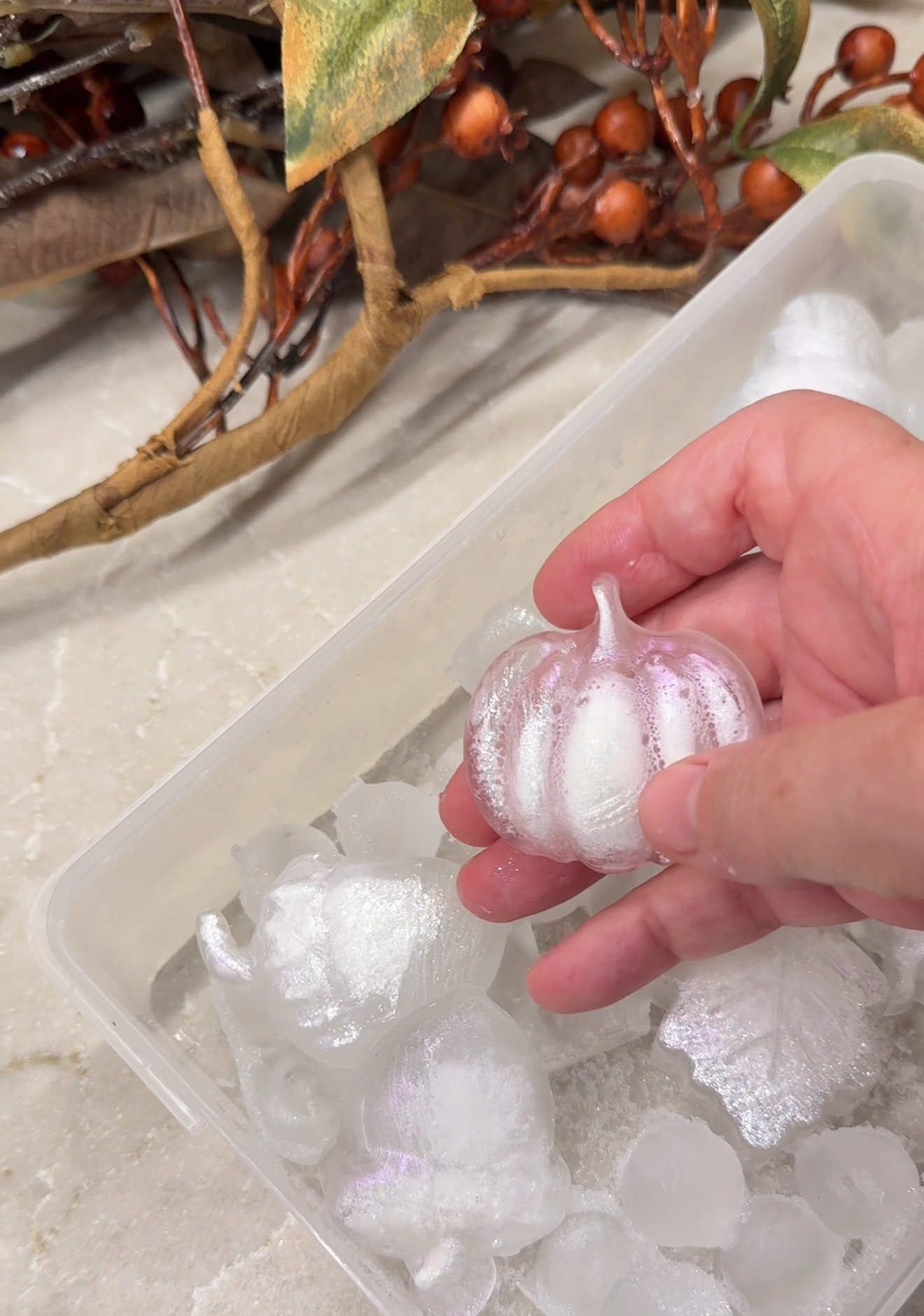 Call ice cube with glitter, pumpkin leaves, and acorns. Silicone molds.