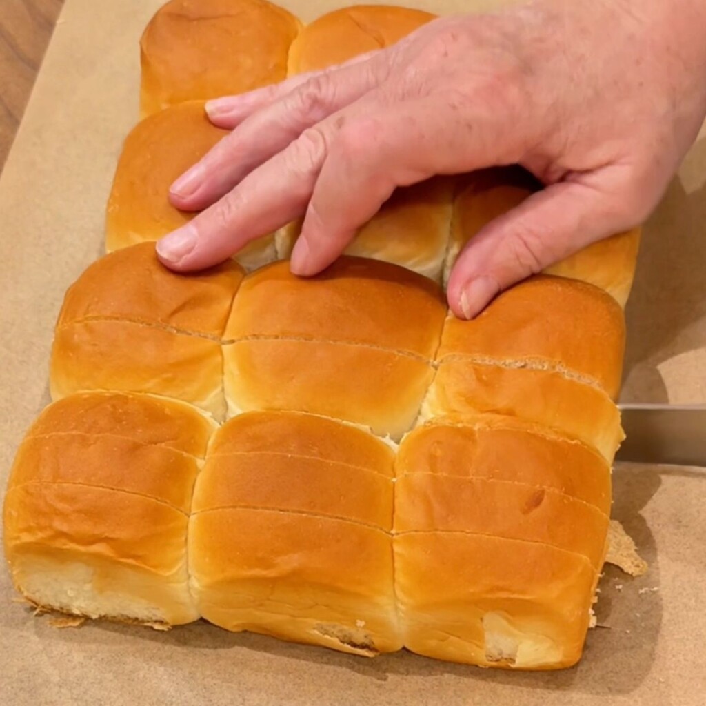 Step-by-step on how to make the grilled cheese sliders and options to add turkey, ham or steak.