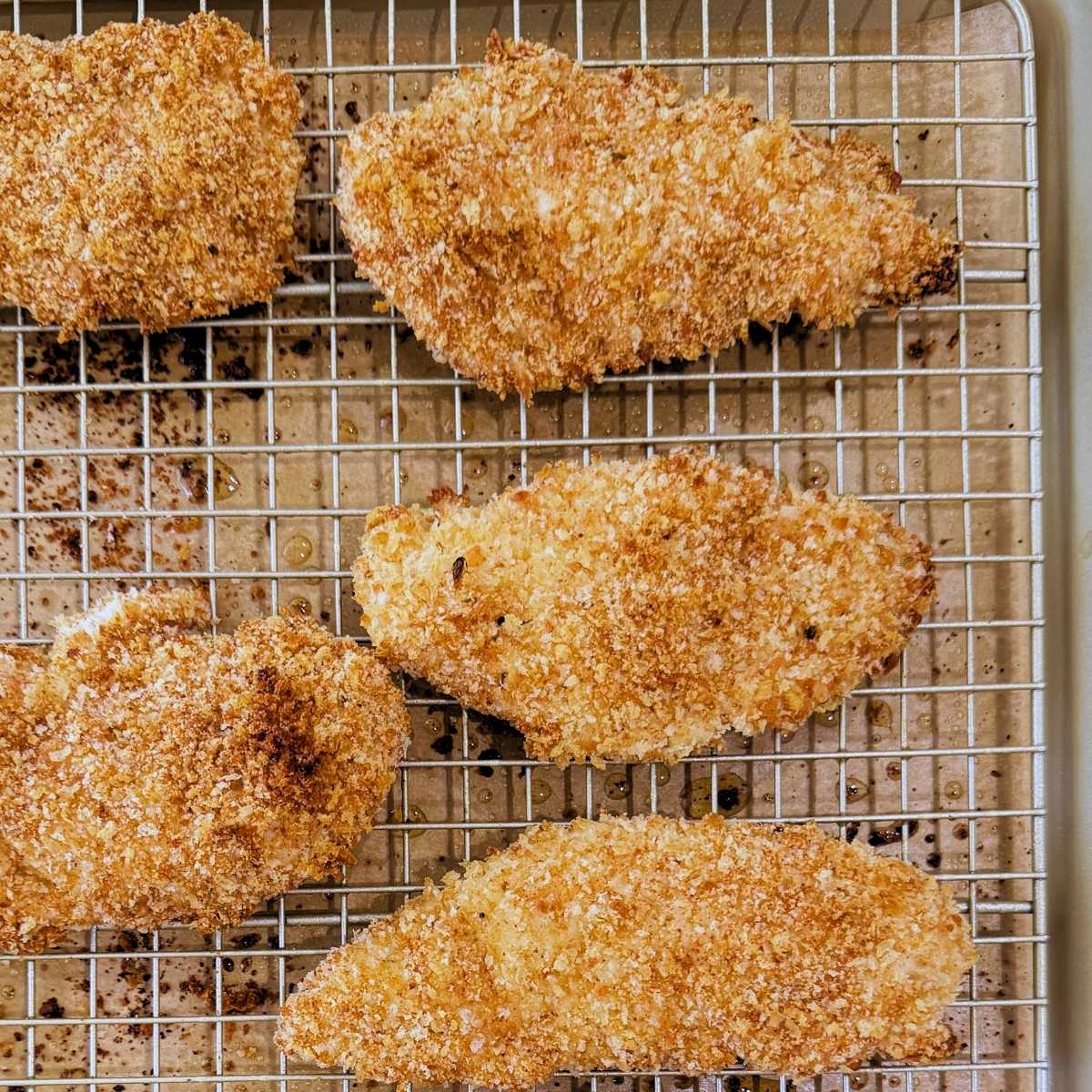  Chicken Fingers Recipe on a wire rack and sheet pan.  