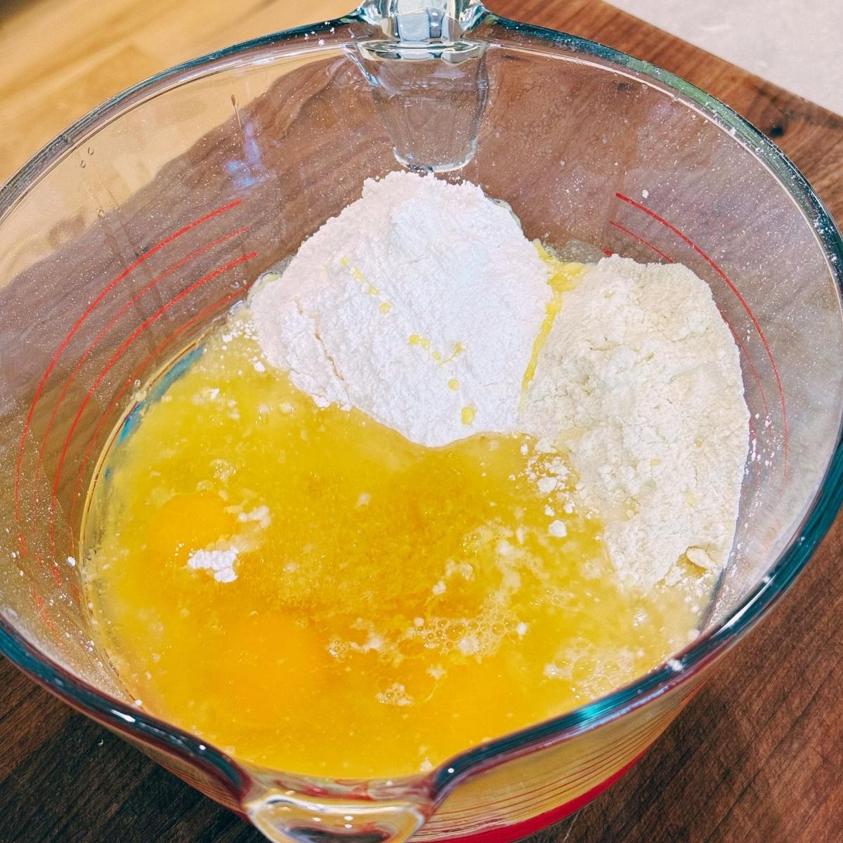 Lemon blueberry Bundt cake ingredients in bowl.