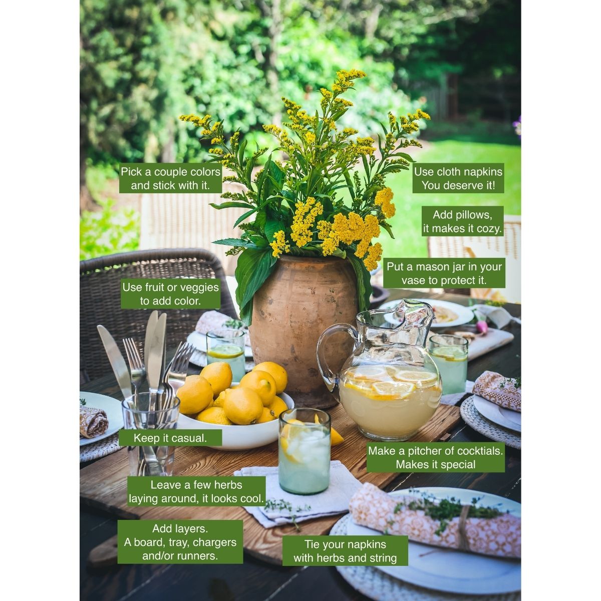 Outdoor dinner party table with lemons, pitcher drinks, flowers, and cozy layered place settings