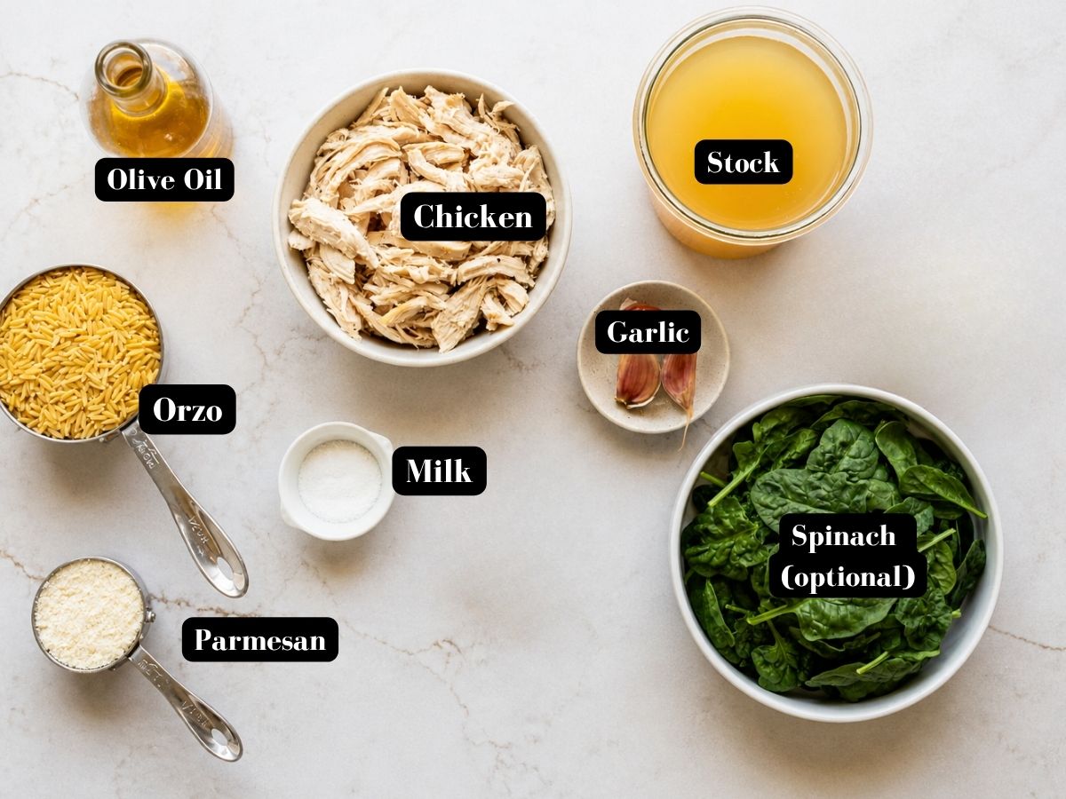 chicken orzo pasta ingredients on a marble slab.