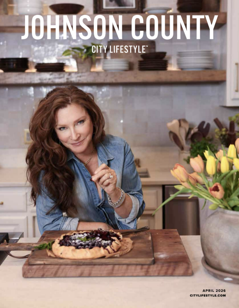 Johnson County Lifestyle Magazine with Lauren Lane in her kitchen with a blueberry crostata.